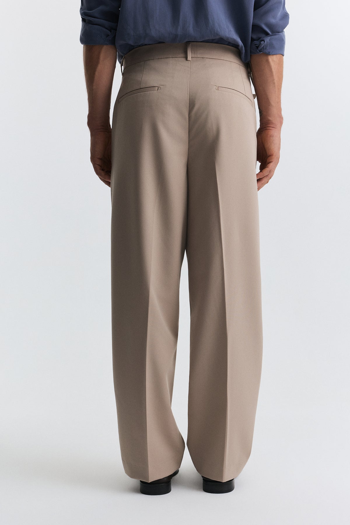 Arched-Waist Pleated Pants